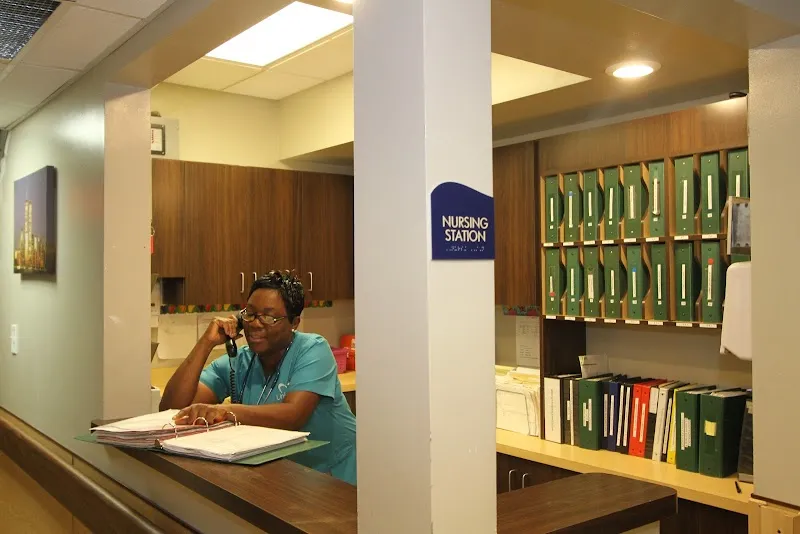 Nursing station with staff member at University Center detox center in Bronx.