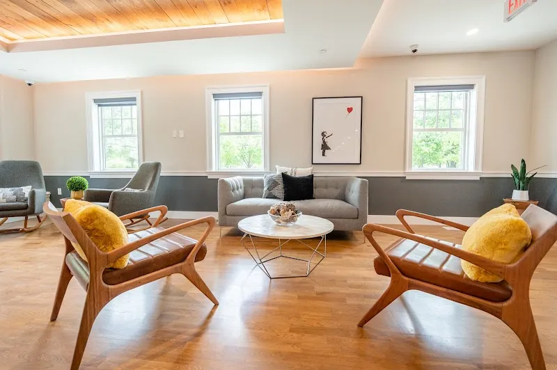 Sunlit shared living room at Sunrise Detox - Long Island Drug & Alcohol Detox center in Bronx.